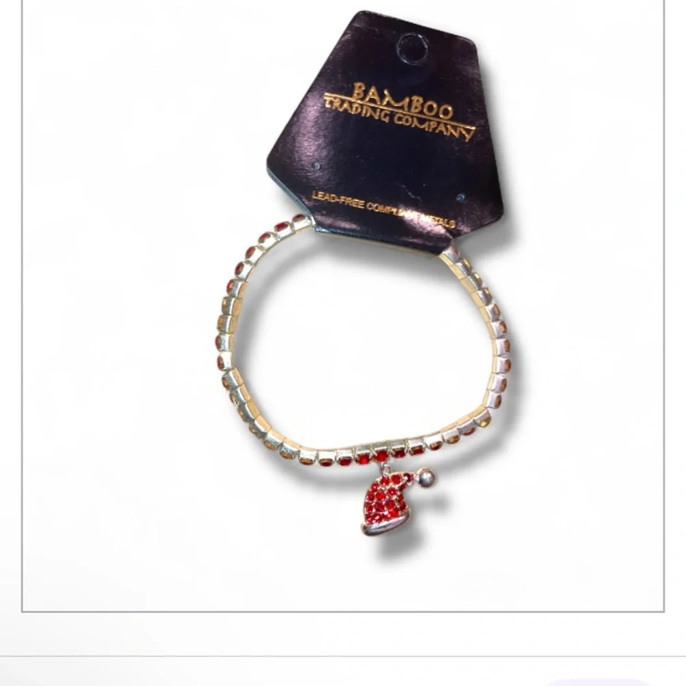 Bamboo Trading Company  Red Crystal Stretch Bracelet With Santa Hat Charm  NWT